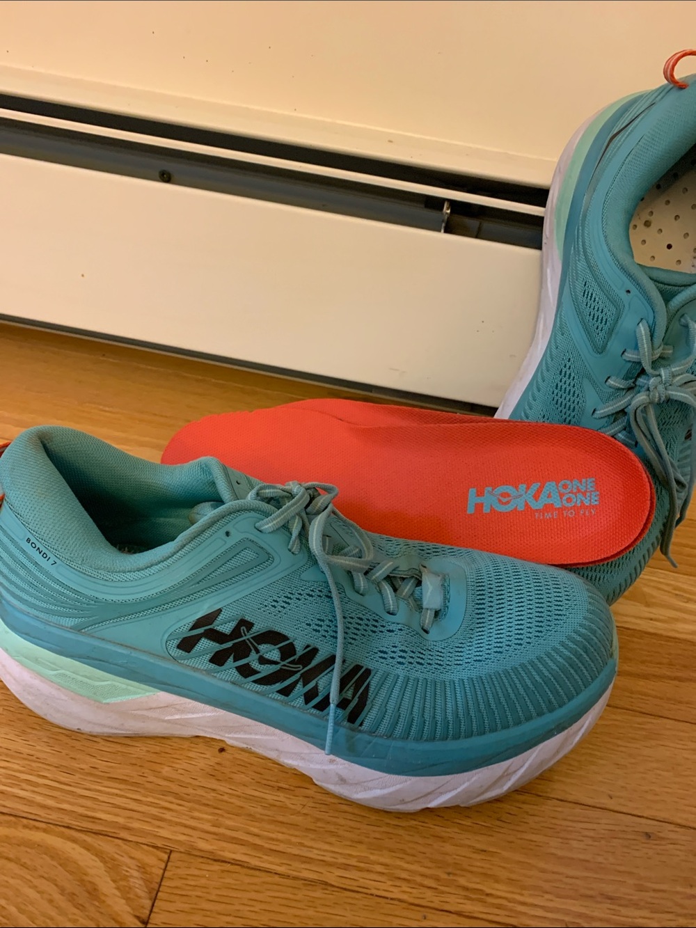 Hoka Women’s Teal Athletic Running Shoes with Coral Insole
